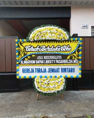 Papan Bunga Duka di Bulik